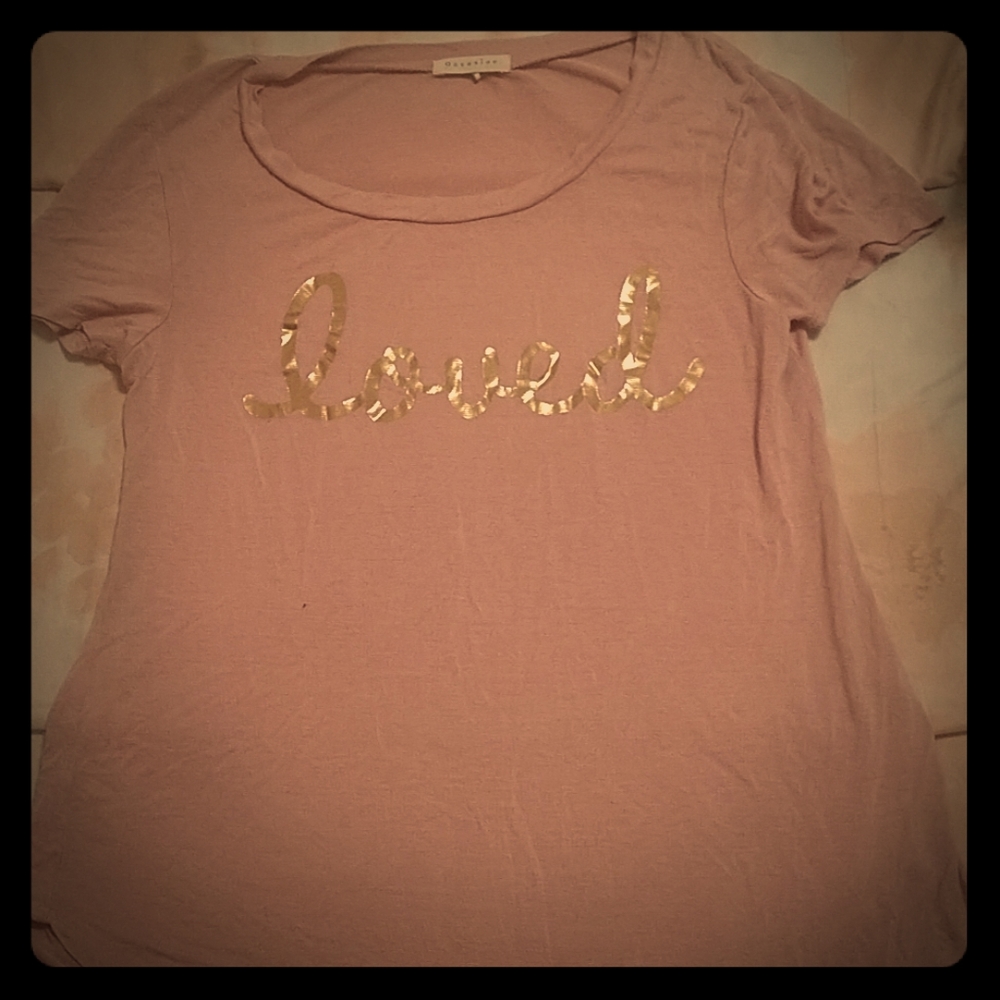 Shirt that says "loved"
